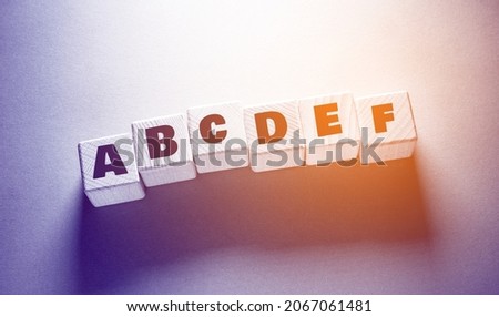 Alphabet English Word Written on Wooden Cubes