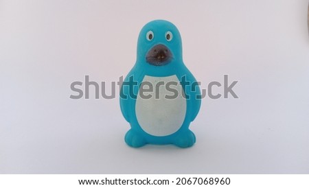 blue penguin doll on white background