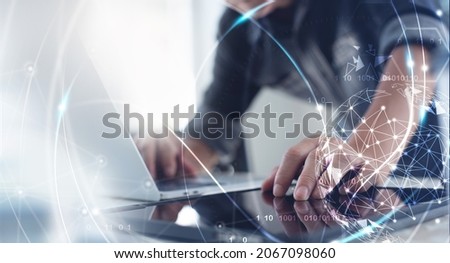 Internet network technology, digital software development, future tech background, IoT concept. Man using digital tablet and laptop with global network connection, computer code
