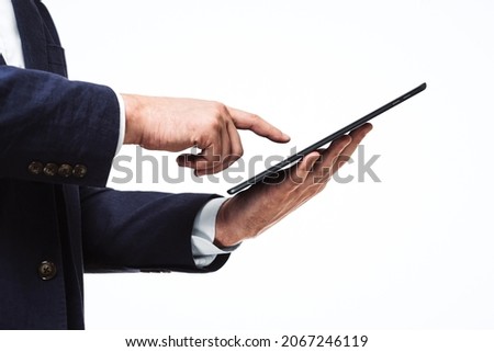 Man using digital tablet, close up. Technology concept