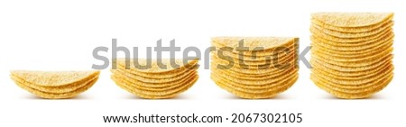 Collection of potato chips stacks, isolated on white background Royalty-Free Stock Photo #2067302105