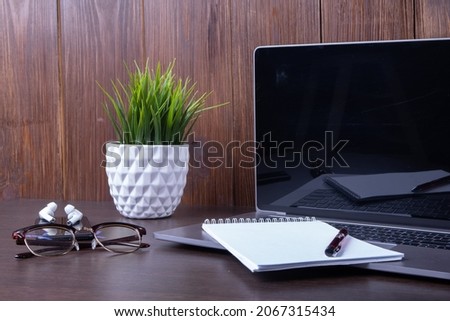Working with a laptop computer with a connection to a webinar to view e-business, business concept