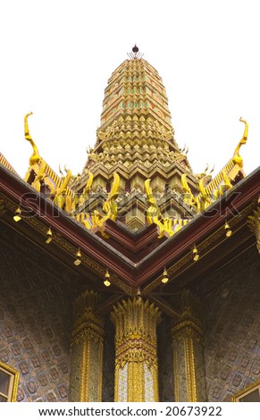 Historic architecture at The Grand Palace in Bangkok, Thailand. Set against a white background.