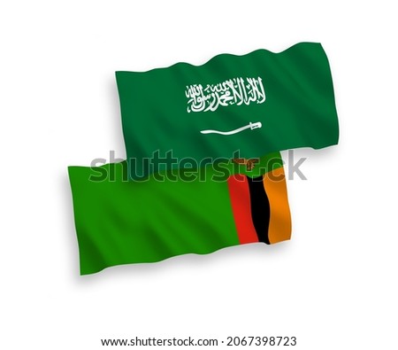 National vector fabric wave flags of Saudi Arabia and Republic of Zambia isolated on white background. 1 to 2 proportion.