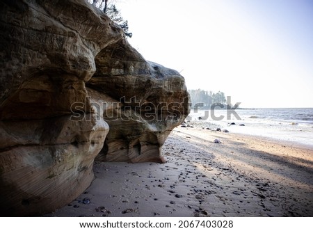 Sandy cliffs by the Baltic Sea on a sunny autumn morning