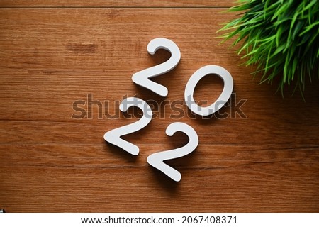 2022 numbers on wood background,Business Concept,Top view