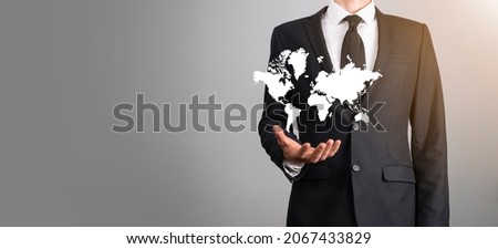 Holding a glowing earth globe social network in the hands of businessmen.World map icon,symbol.