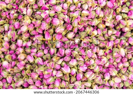 Flowers and rosebuds. Dry rose flowers. Turkish rose flower tea. Healthy tea. A mixture of rose petals and buds for a drink