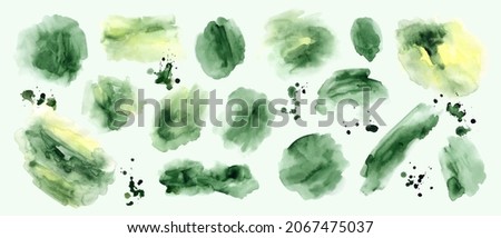 Set of green and yellow watercolor blots, splatters, washes, backgrounds. Hand painted design elements.