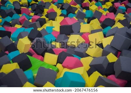 multi-colored foam rubber cubes in the trampoline center