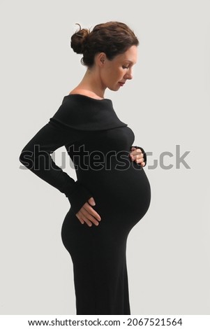 Young beautiful pregnant woman waiting for the birth of her baby. 