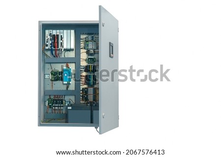 modern electric control cabinet with open door isolated on a white background Royalty-Free Stock Photo #2067576413