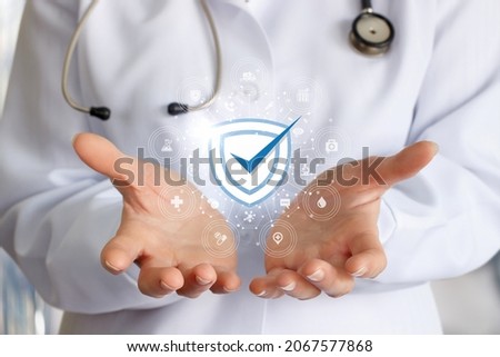 The concept of the quality of medical care. The doctor shows a guarantee of high-quality performance of services.