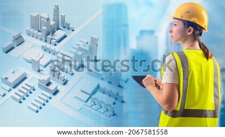 architect is working. Architect woman holding tablet. Girl planner near layout of city. Girl engineer in yellow uniform. Professional engineer with his back to camera. Volumetric city map. Royalty-Free Stock Photo #2067581558