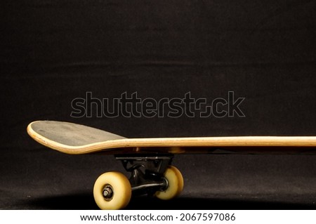 A skateboard isolated on a black background