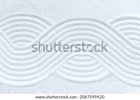 Zen pattern in white sand Royalty-Free Stock Photo #2067599420