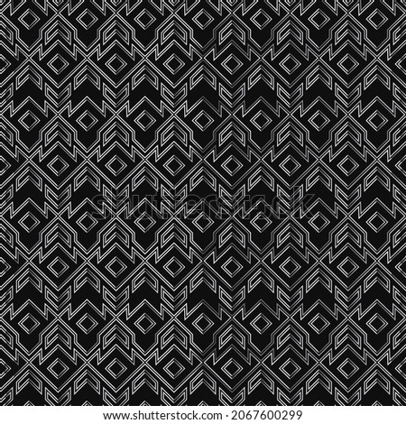 Monochrome tribal texture with metal effect.