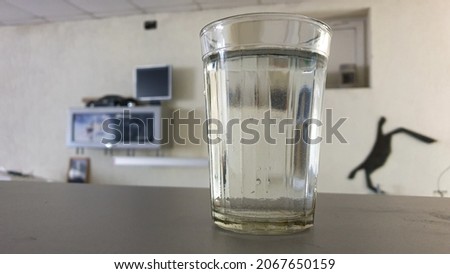 A glass of water on the table