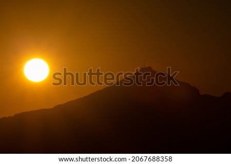 Orange sunrise over the hill 