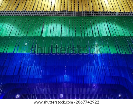 Colorful of colored stripes that clinging to the ceiling, interior design in the building.