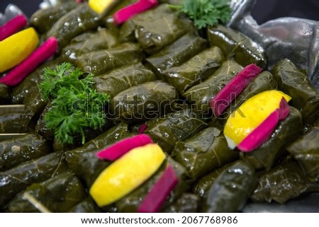 Dolma is served at a dinner buffet at an event. 