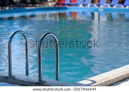 Swimming pool with stair at sea resort