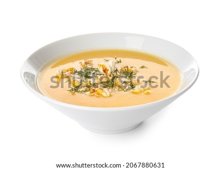Bowl with tasty popcorn soup on white background