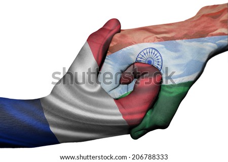Diplomatic handshake between countries: flags of France and India overprinted the two hands