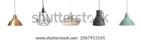 Stylish lamps on white background Royalty-Free Stock Photo #2067913145