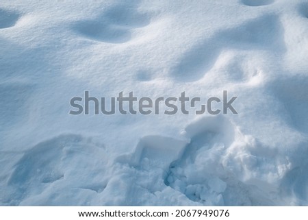 Fluffy white snow. Winter background. Christmas and New Year time