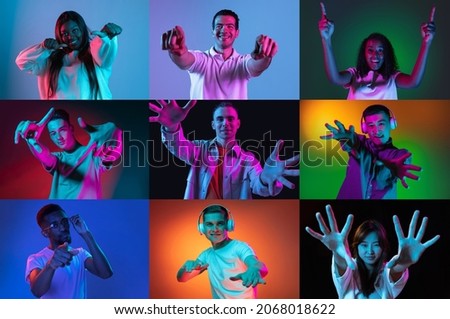 Gesturing. Collage of made of happy male and female models isolated on colored backgorund in neon light. Concept of equality, unification of all nations, ages and interests. Look happy, excited Royalty-Free Stock Photo #2068018622