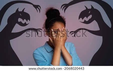 Inner Fears. Teen Black Girl Scared By Illustrated Shadow Monsters Around Her, Worried African American Female Teenager Covering Face With Both Hands And Peeking Through Fingers, Creative Collage