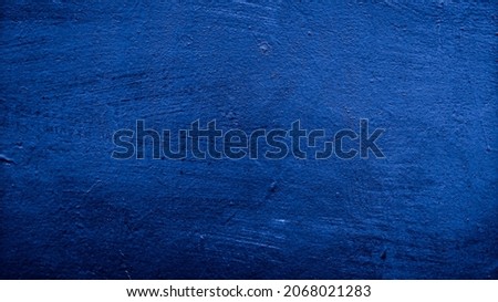 old blue texture background of wall cement