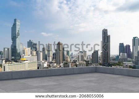 Panoramic Bangkok skyline view, concrete observatory deck on rooftop, daytime. Luxury Asian corporate and residential lifestyle. Financial city downtown, real estate. Product display mockup empty roof Royalty-Free Stock Photo #2068055006