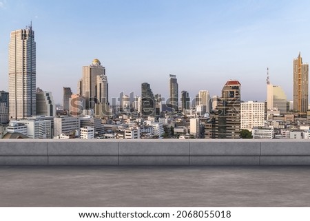 Panoramic Bangkok skyline view, concrete observatory deck on rooftop, daytime. Luxury Asian corporate and residential lifestyle. Financial city downtown, real estate. Product display mockup empty roof Royalty-Free Stock Photo #2068055018