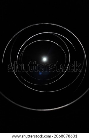Flash of light through rings