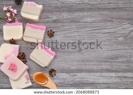 Homemade soap product for bathroom, soap organic handmade with oils, herbal, and lavender ingredient,  natural aromatic spa treatment decoration on wooden vintage background