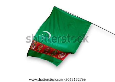 Turkmenistan flag isolated on white background. close up waving flag of Turkmenistan. flag symbols of Turkmen.
