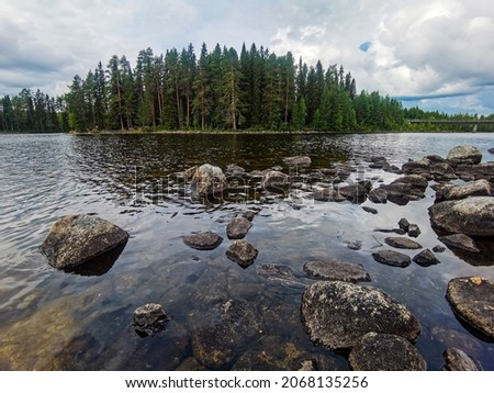 river in the forest sky and clouds, beautiful photo digital picture , picture taken in Sweden, Europe