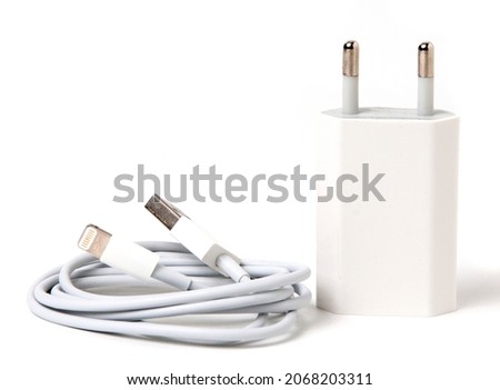Iphone phone charger isolated on the white background Royalty-Free Stock Photo #2068203311