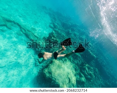 Underwater photo of man snorkeling 