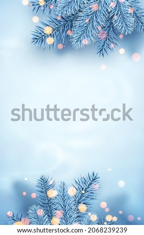 Frosted blue spruce branches frame. Bokeh lights. Space for text. Card, poster, flyer template. Winter Xmas vector illustration.