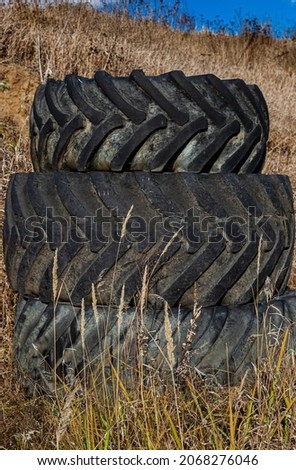 old rubber tires stacked on top of each other. High quality photo