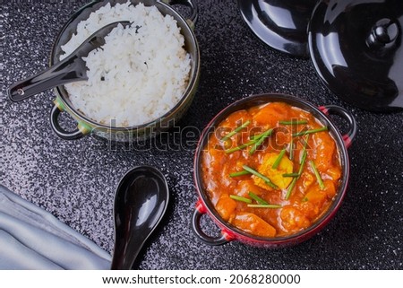 Chicken and pumpkin curry with rice.
