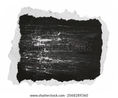 Black blank photo frame and empty scratched cardboard scrap, piece isolated on white background, clipping path