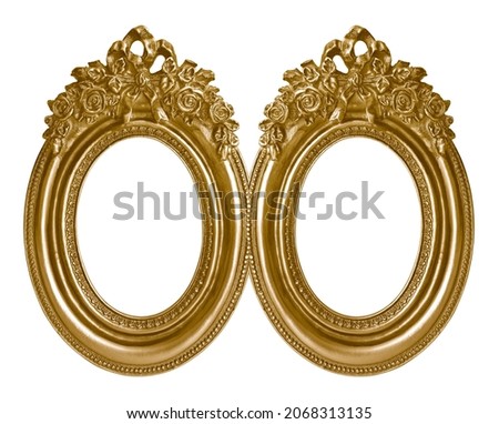 Double oval golden frame (diptych) for paintings, mirrors or photos isolated on white background. Design element with clipping path