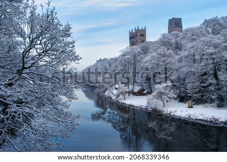 Durham Cathedral Towering over the River Wear with Frozen Trees. Durham City, County Durham England, UK. Royalty-Free Stock Photo #2068339346