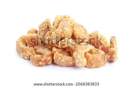 Pork snack or Pork scratching leather lean pork fried crispy and blistered isoloated on white background. Thai food Royalty-Free Stock Photo #2068383833