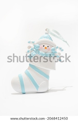Christmas Sock. Christmas gift representing family on white background. Ornament.