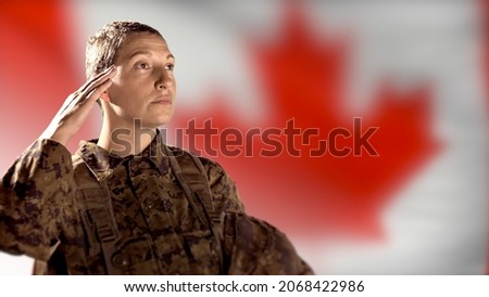 Female Woman Soldier, Canada Flag Military Salute, CADPAT Army Veteran Saluting Royalty-Free Stock Photo #2068422986
